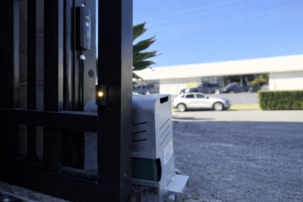 Photo electric safety beam sensor installed on automatic gate to prevent closing on vehicles