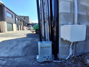 Automatic gate motor with motor safe lock box installed on sliding gate Gold Coast