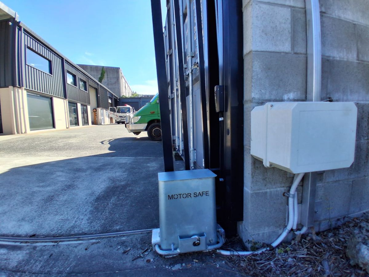 Automatic gate motor with motor safe lock box installed on sliding gate Gold Coast