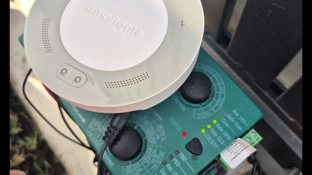 Smart gate controller installed on gate motor system for smartphone control and automation