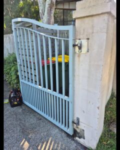 Swing gate hinge repair and adjustment on the Gold Coast