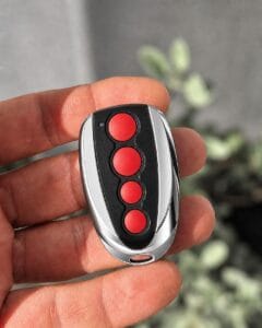 Four button garage and gate remote supplied and programmed by Goldy Garage & Gate Remotes on the Gold Coast